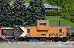 CP 434488(caboose) coupled to CP 401036(snow plow) located in the south storage area of the CP Rail Revelstoke Yard.